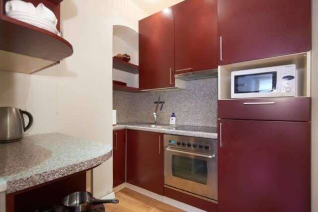 Апартаменты Old Town Apartment at Šv. Mikalojaus Вильнюс-15